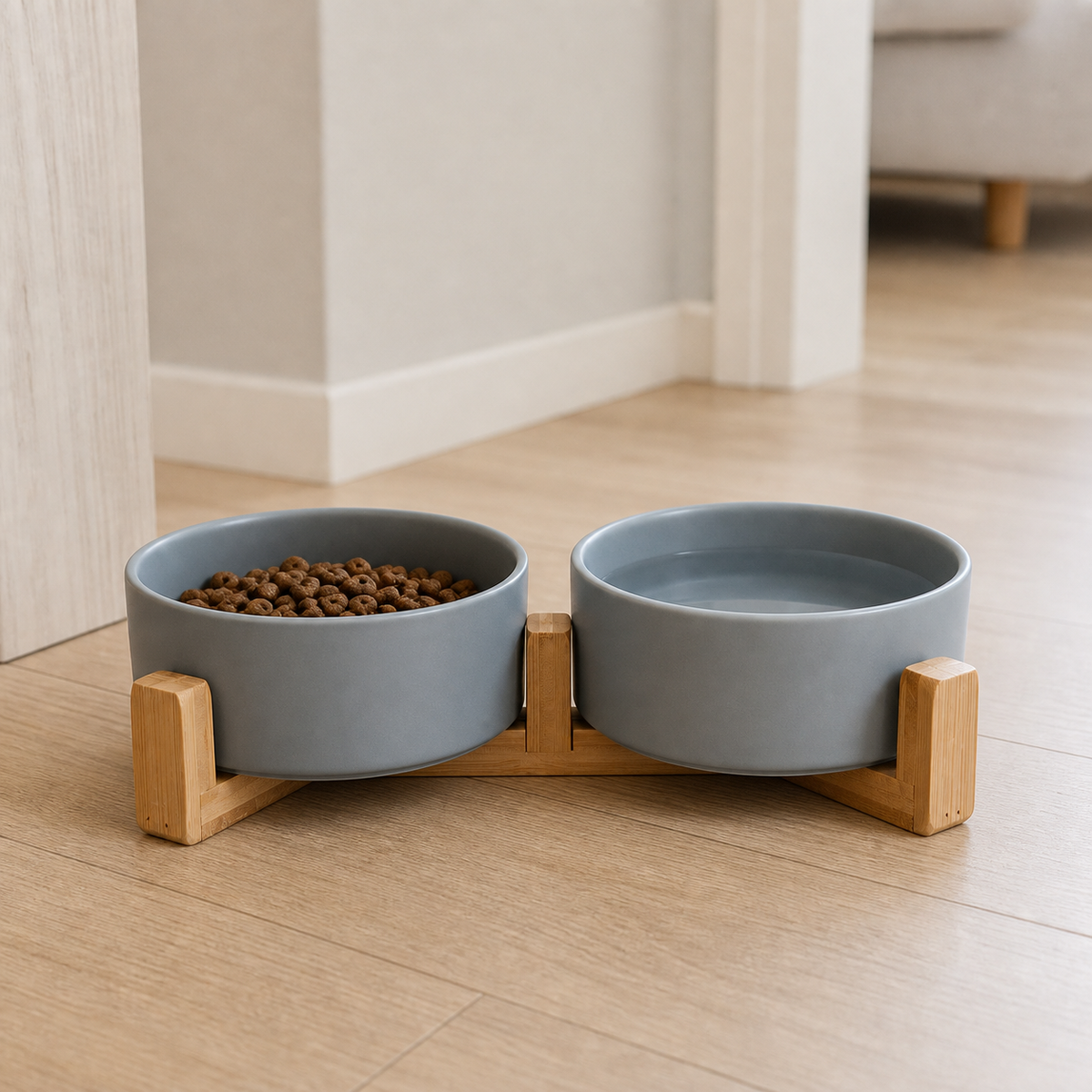 Grey Dine ceramic cat bowls on a bamboo stand with kibble and water